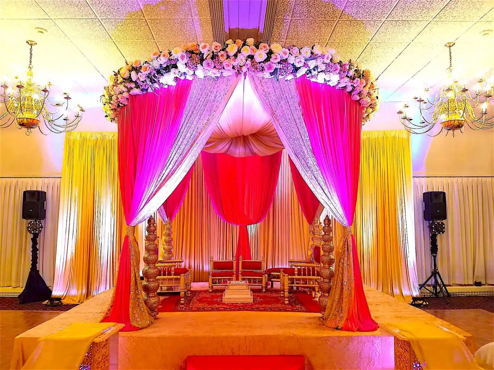 Fabric mandap with draped pillars for Indian wedding ceremony, Chicagoland