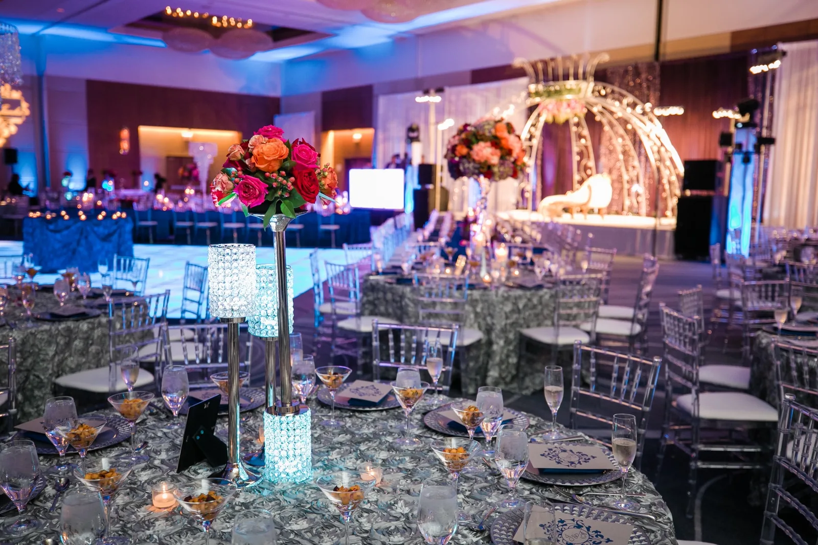 Elegant carriage accent at Indian wedding reception decor