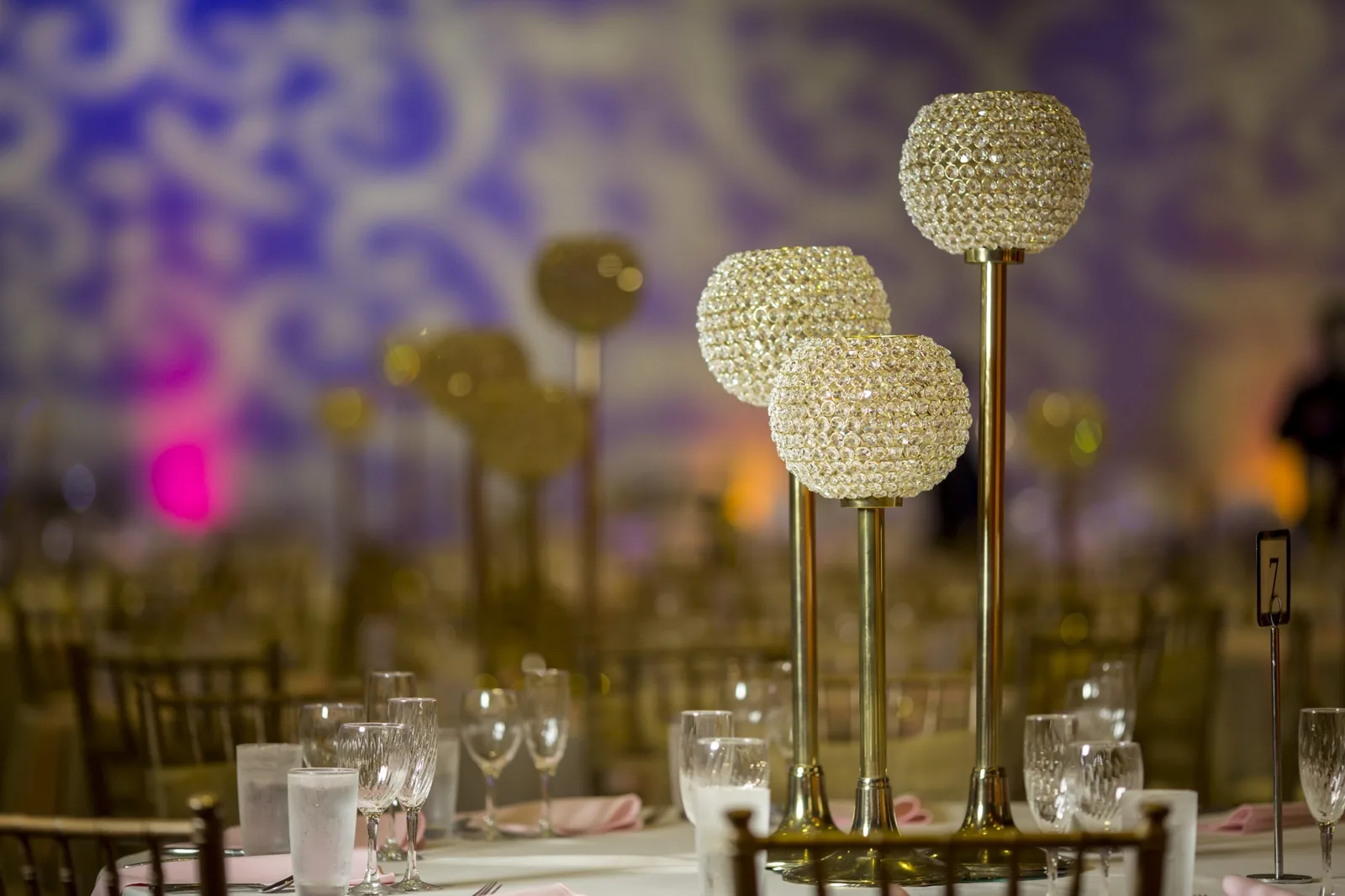 Glittering floral reception stage at Indian wedding in Chicagoland