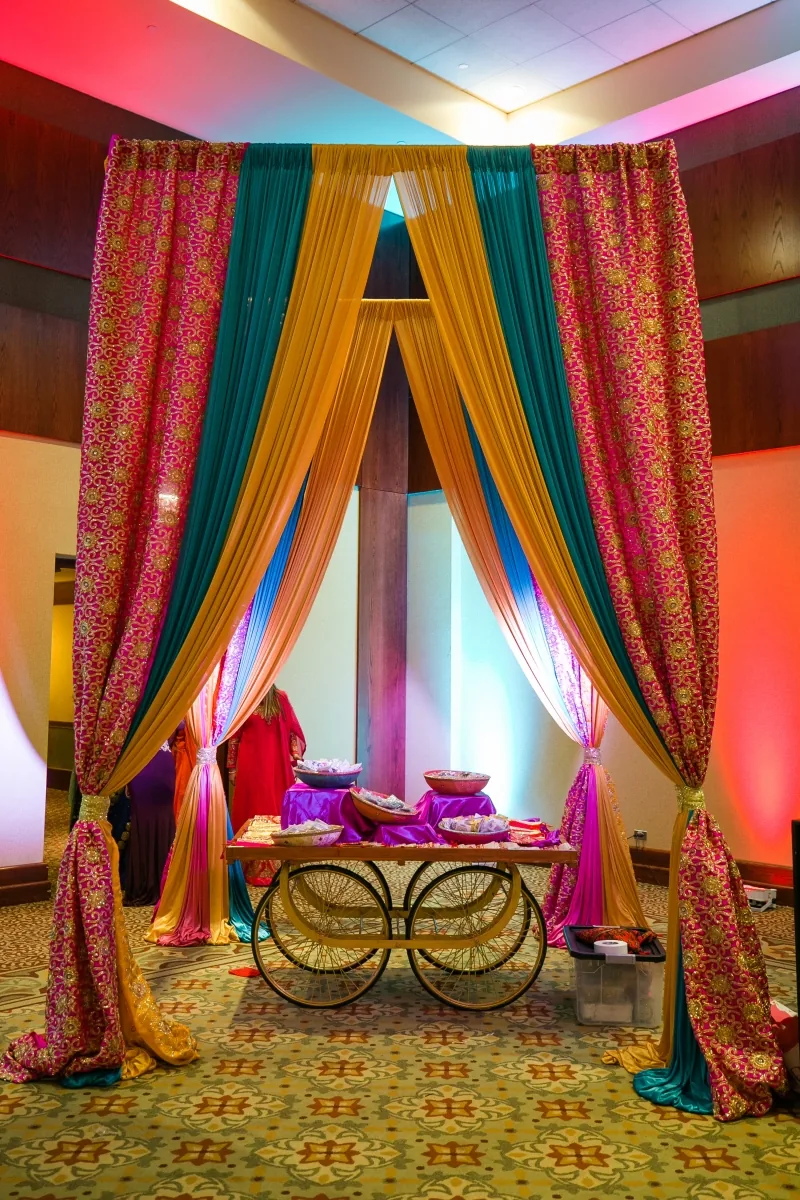 Fabric canopy with decorative props for sangeet or mehndi event