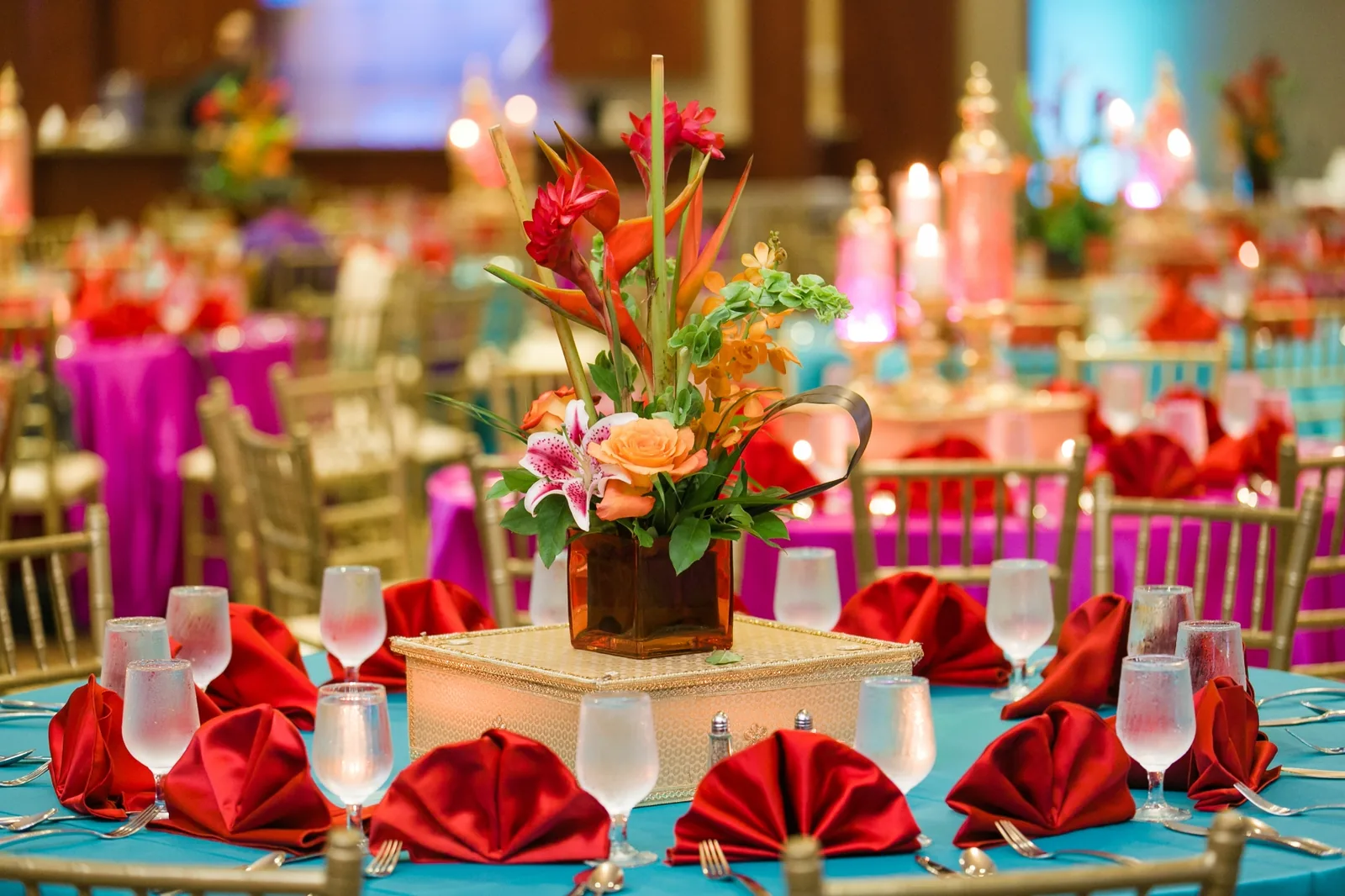 Bold colorful floral arrangements for sangeet or garba event