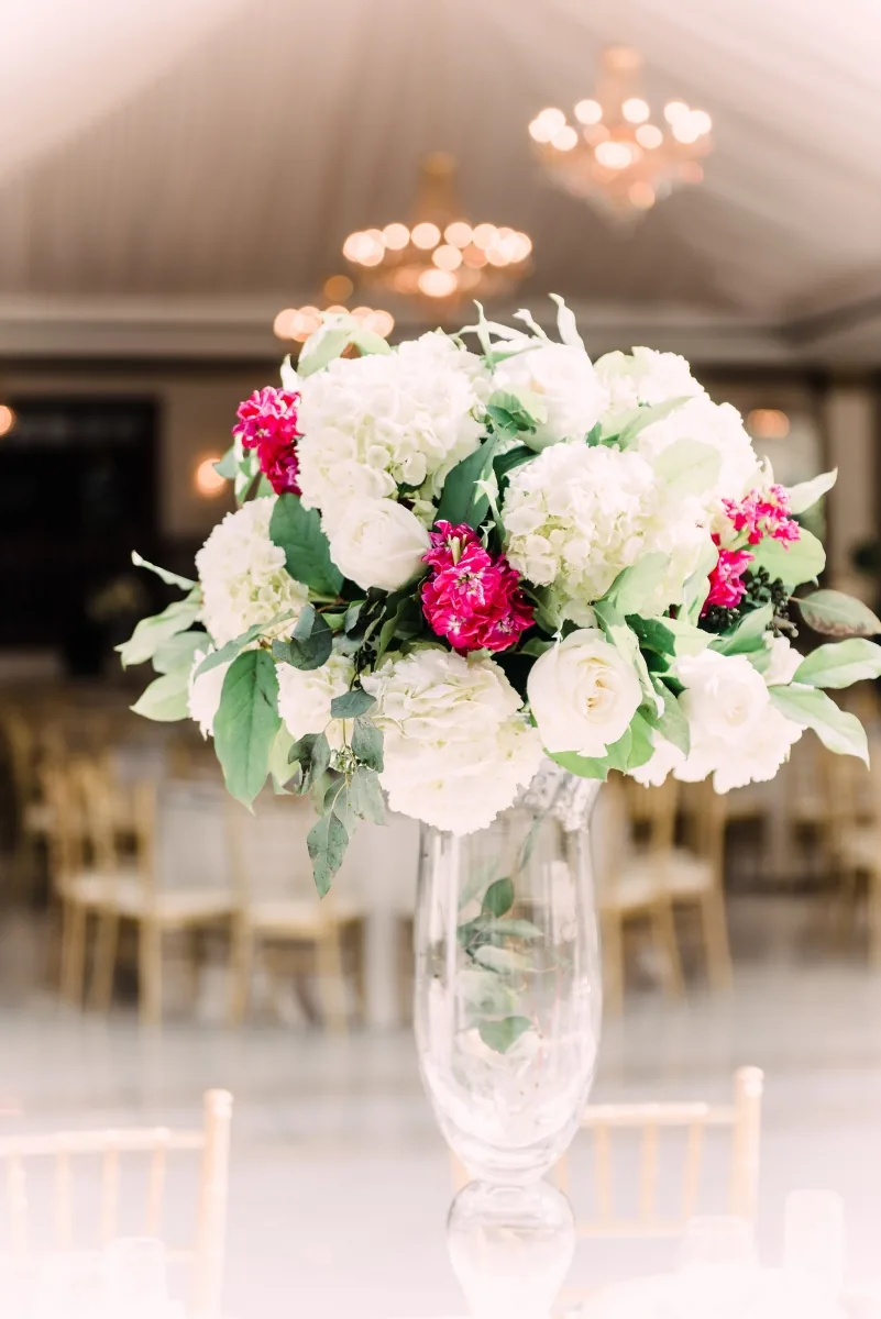 Elegant white flower arrangements for Indian wedding reception