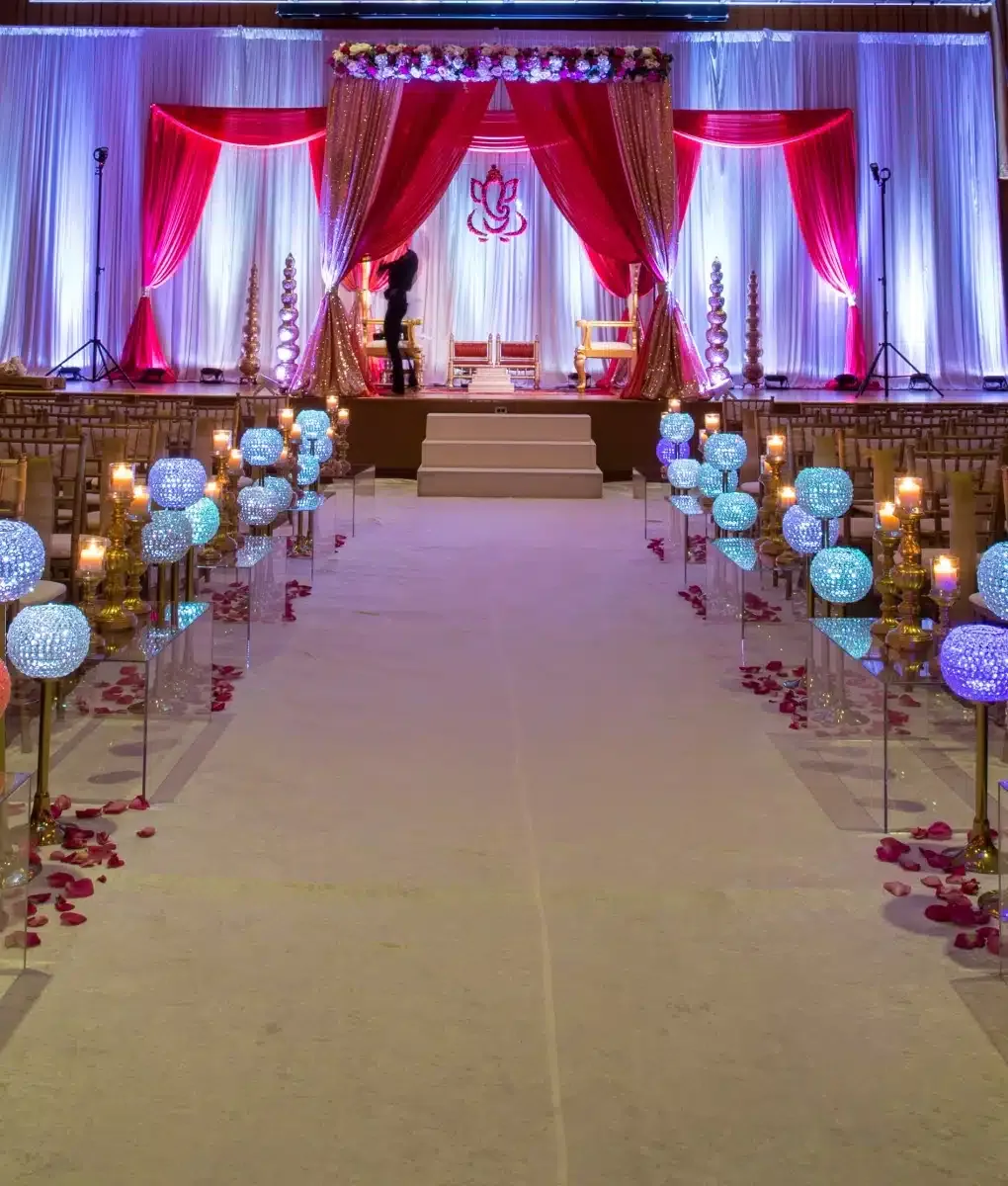 Fabric mandap with lighted crystal aisle for Indian wedding ceremony