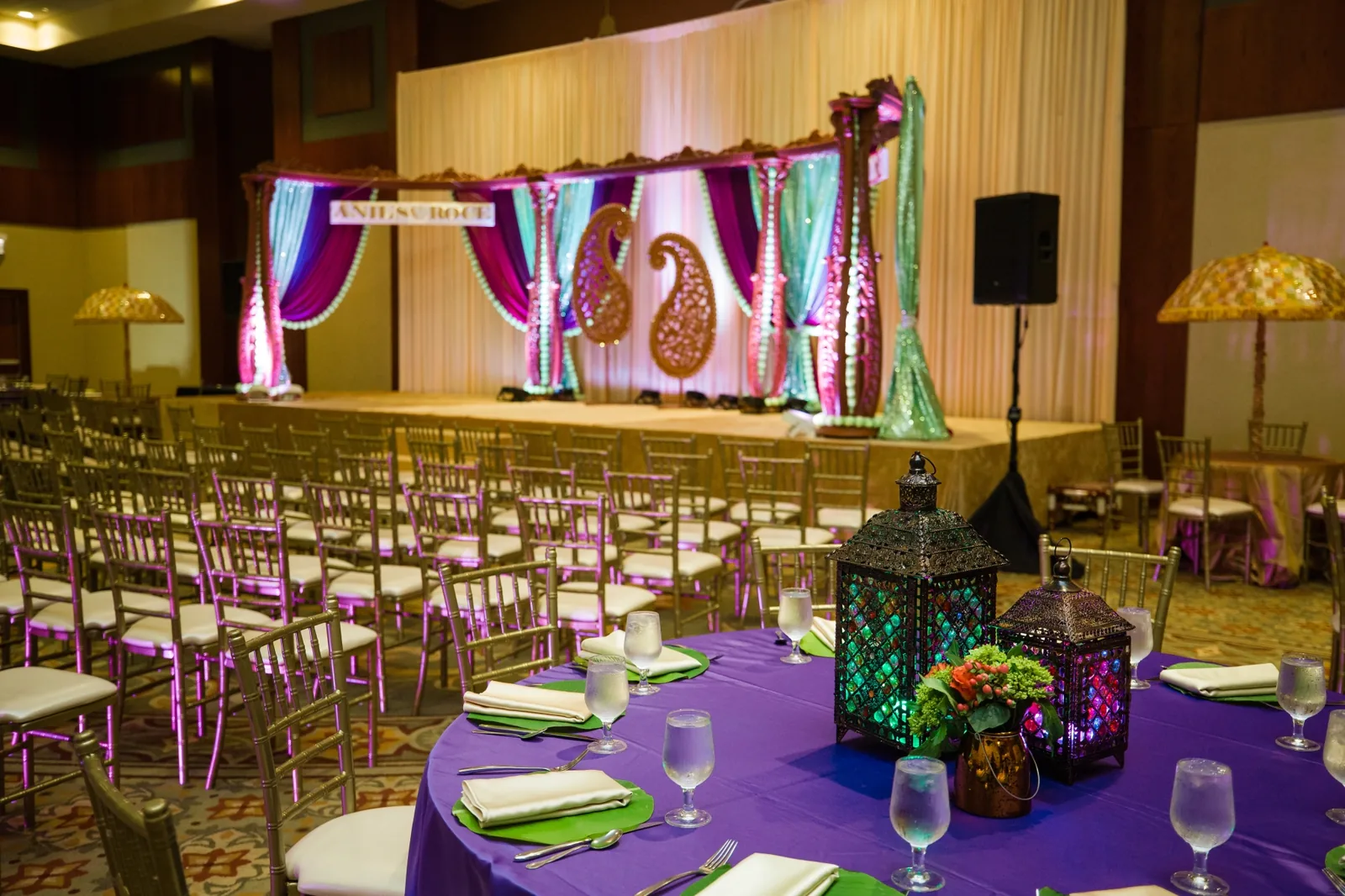 Rich jewel-toned floral arrangement for Indian sangeet event