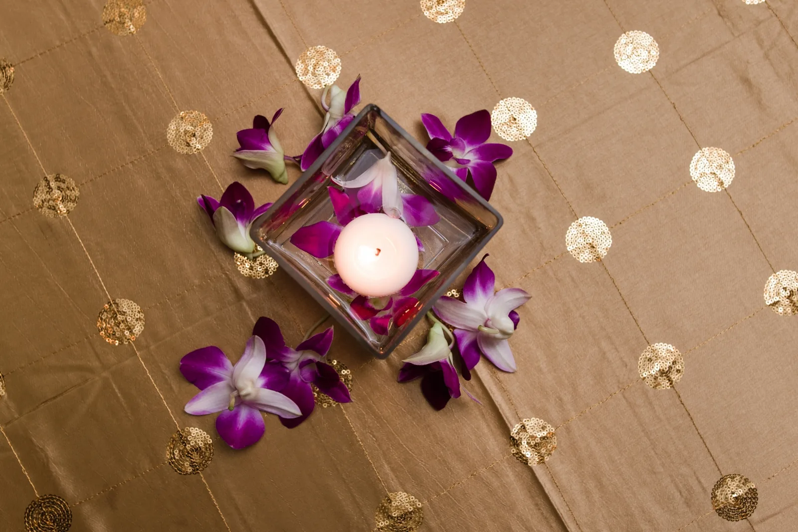 Opulent jewel-toned decor for Indian sangeet or mehndi event