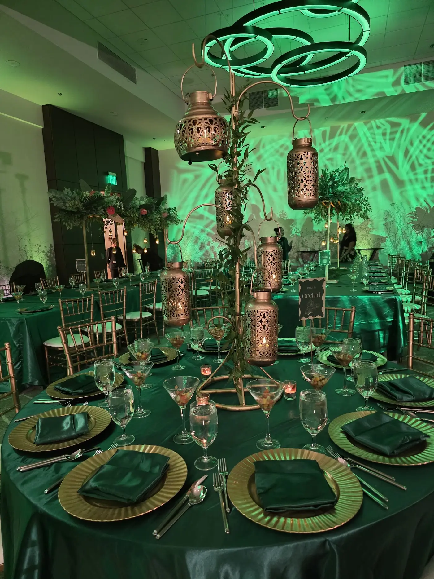 Lush jungle-style floral centerpiece for Indian wedding reception by Poonam Creations, Chicagoland