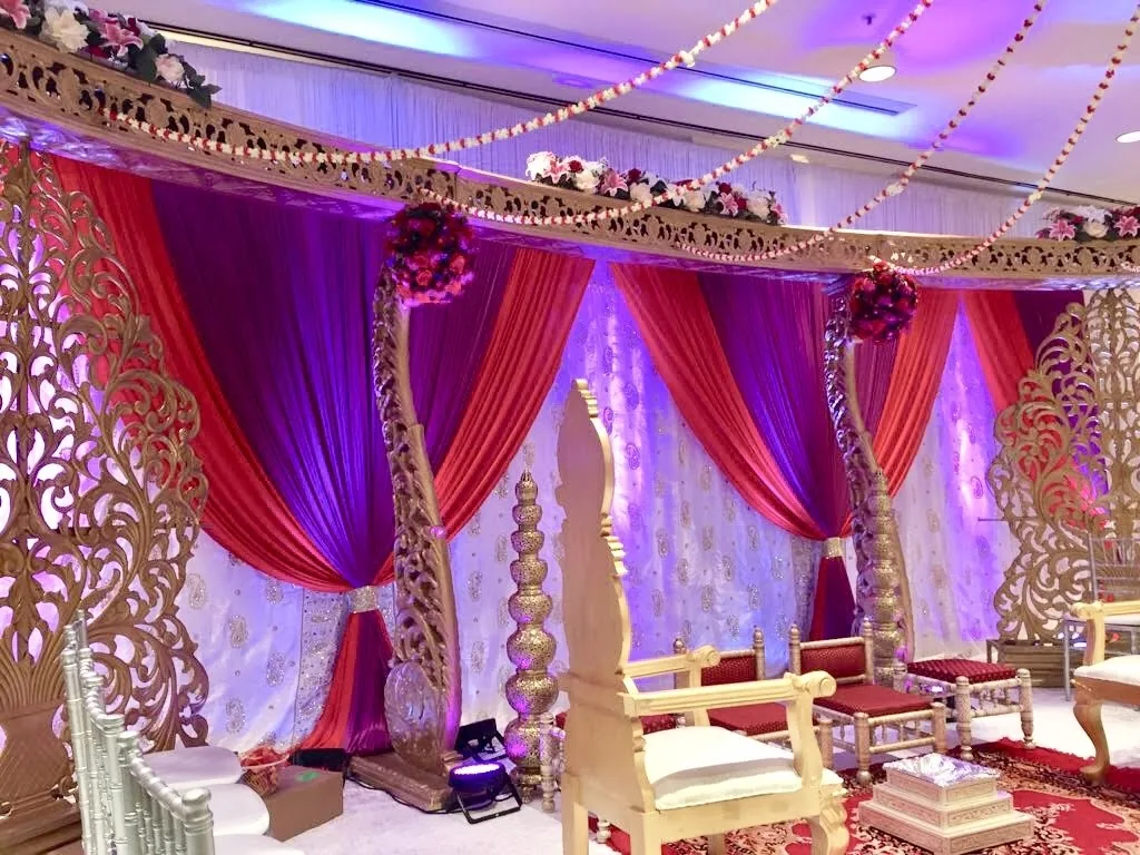 Open golden mandap design for Indian wedding ceremony