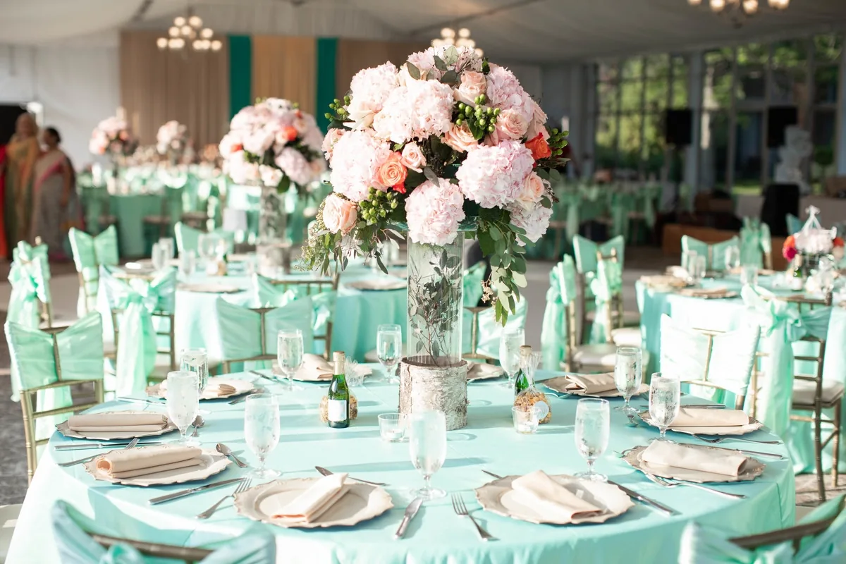 Mint and teal floral centerpieces for Indian wedding reception